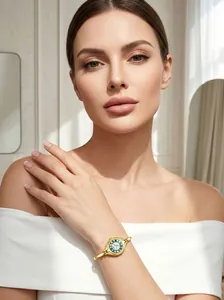 Elegant GEDI gold-tone bangle watch with vintage round dial on woman's wrist