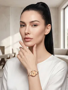Elegant rose gold stainless steel strap watch worn by a female model for professional business style