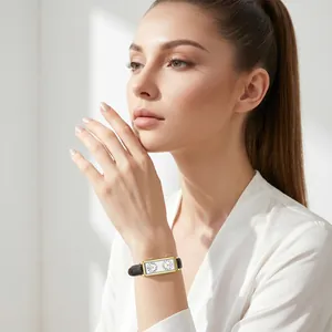 Elegant French vintage dual-dial rectangular watch with gold case and black leather strap