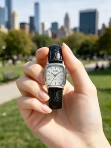 GEDI vintage women's square quartz watch featuring a black leather strap and textured glitter dial