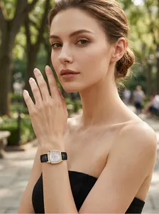 Elegant CEDI vintage square watch with glitter dial and black leather strap on a model