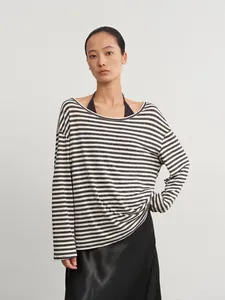 Minimalist women's striped long-sleeve cover-up with black tank top two-piece set outfit