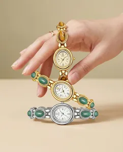 Detail view of vintage GEDI quartz watches with elegant gemstone-inlaid bracelets.