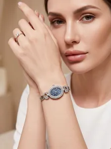 Élégante montre-bracelet GEDI ovale strass pour femme avec cadran à chiffres romains