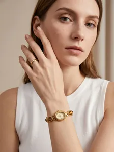 Detailed close-up of GEDI vintage oval watch with tiger eye stone bracelet on wrist