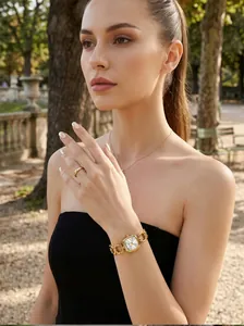 GUOU elegant women's square gold watch with stylish hollow chain link strap on model