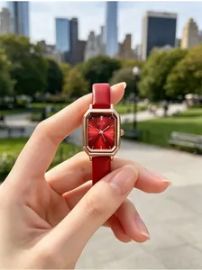 Close-up of GEDI vintage red square watch with rose gold case and leather strap