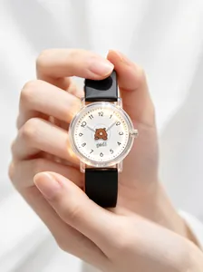 Detailed view of a Gedi cartoon bear watch featuring a soft black silicone strap for girls