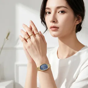 Montre GEDI élégante pour femme avec cadran en nacre bleue et bracelet en acier doré