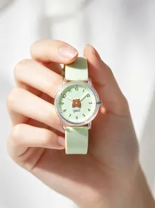 Mint green children's quartz watch with a cute bear dial and soft silicone strap