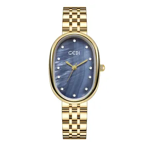 Montre GEDI pour femme dorée avec cadran ovale en nacre bleue et diamants
