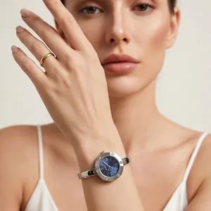 Elegant Gedi round quartz bangle watch for women with blue dial and Roman numerals