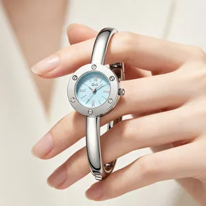Elegant silver bangle watch for women featuring light blue dial and Roman numerals