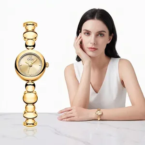 Elegant GEDI vintage dameshorloge met gouden ronde wijzerplaat en metalen kralenarmband