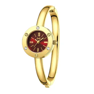 Elegant Gedi gold bangle watch with red dial and Roman numeral accents