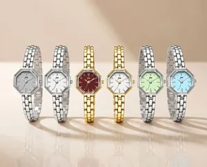 Close-up detail of stylish women's octagonal quartz watches with steel link bands