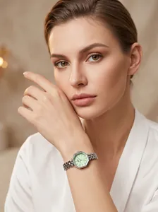 Elegant silver octagonal women's quartz watch with mint green face and steel strap