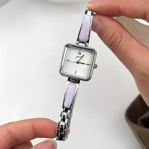 Elegant women's square quartz bracelet watch with pink enamel and silver finish