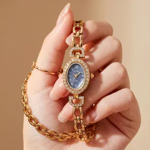 Montre ovale dorée élégante pour femme avec cadran bleu et strass GEDI