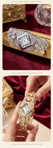 Detailed view of luxury diamond-encrusted quartz watches for women in gold and silver