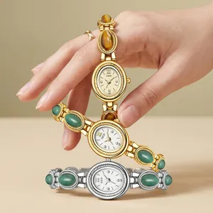 GEDI vintage women's quartz watch with jade bracelet and oval diamond dial in gold and silver finish