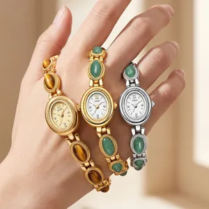 GEDI vintage oval bracelet watch with stone inlays and rhinestone accents on hand