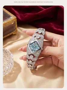 Close-up detail of a luxury women's quartz watch with a sparkling rhinestone bracelet