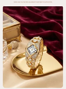 Macro view of the sparkling crystal-set gold-tone bracelet and square Roman numeral dial.