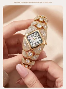 Detailed view of luxury gold-plated bracelet watch with diamond-encrusted design