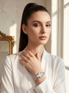 Detail shot of elegant silver ladies' quartz watch with sparkling diamond hour markers