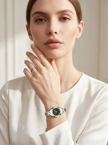 Elegant GEDI women's watch with green dial and rhinestone markers on silver strap