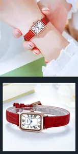 Vue détaillée d'une montre rectangulaire vintage avec bracelet en cuir rouge et chiffres romains