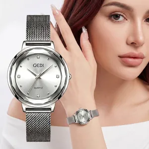 Élégante montre à quartz en acier inoxydable argenté pour femme avec index diamant
