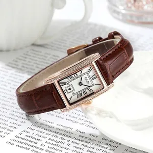 Elegant vintage style rectangular women's quartz watch with a brown leather strap.