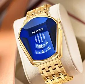 Detail of gold BESTWIN men's quartz watch with unique blue shield-shaped crystal