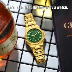 Close-up detail of luxury gold-tone men's business watch featuring a green sunburst dial