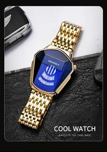 Detailed shot of the gold snake-head quartz watch with a deep blue faceted dial