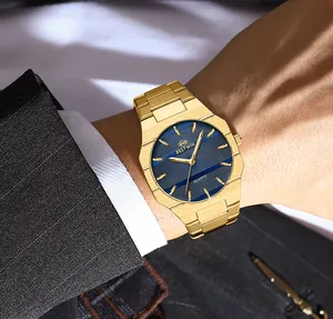 Premium gold Bestwin business watch for men featuring a blue dial and pinstripe suit.