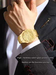 Close-up detail of BESTWIN gold luxury men's business watch worn with a formal suit.