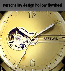 Detailed close-up showing the hollow flywheel and gold dial of this men's mechanical watch