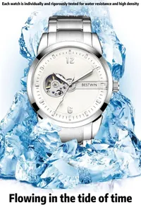 Macro detail of a silver skeleton automatic mechanical watch displayed within clear ice cubes