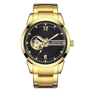 Luxury gold stainless steel automatic mechanical watch for men featuring a black skeleton dial