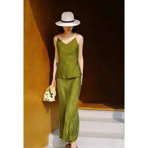 Elegant moss green cupro camisole and fishtail midi skirt set for summer wear