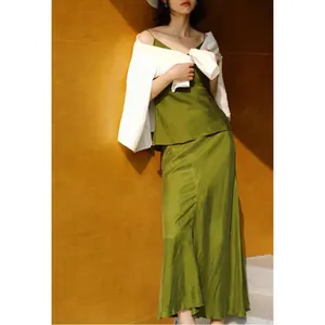 Elegant moss green cupro silk camisole and fishtail midi skirt set for summer days