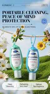 Portable KORMESIC hand sanitizer bottles hanging outdoors in a natural sunny garden