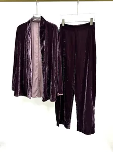 Full view detail of a luxurious purple velvet suit with open-front cardigan and pants