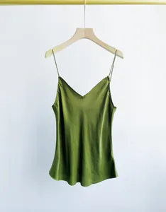 Close-up of heavy sand-washed cupro camisole featuring a silk-like satin texture