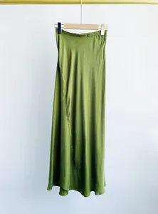 Elegant olive green copper ammonia silk midi skirt with a lustrous satin finish.