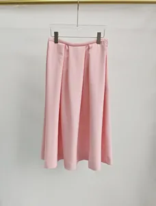 Elegantly draped light pink pleated A-line midi skirt made of silk-wool blend fabric