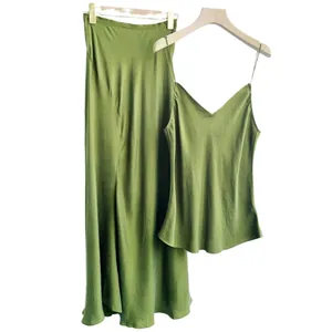 Elegant two-piece cupro silk set with camisole top and mermaid maxi skirt in green